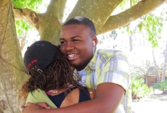 people hugging and smiling